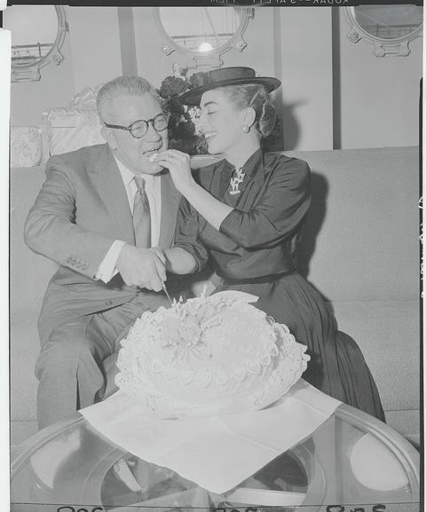 joan crawford feeding cake to husband