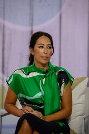 joanna gaines  sitting in chair