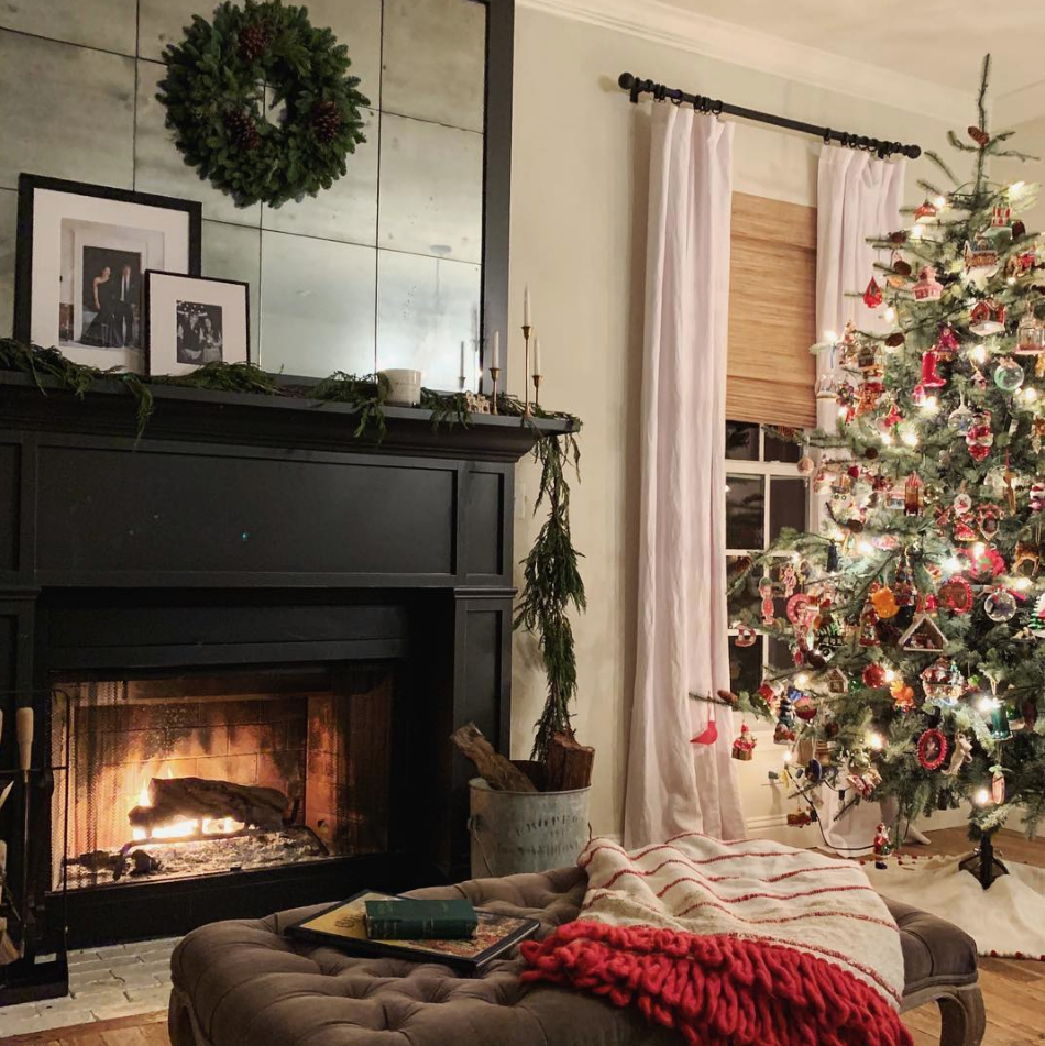 Living room, Hearth, Fireplace, Room, Interior design, Christmas decoration, Home, Christmas tree, Property, Furniture, 
