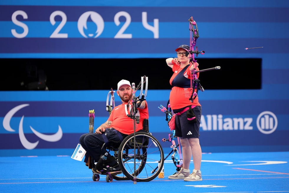 paris, france september 02 jodie grinham and nathan macqueen of team great britain compete during the mixed team compound open quarterfinal match on day five of the paris 2024 summer paralympic games at esplanade des invalides on september 02, 2024 in paris, france photo by alex slitzgetty images