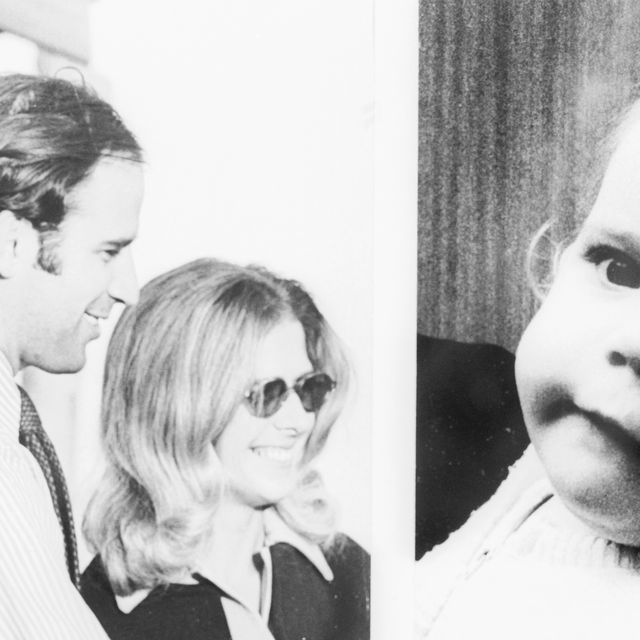 joe biden and neilia biden stand next to each other and smile, amy biden as a baby looks at the camera