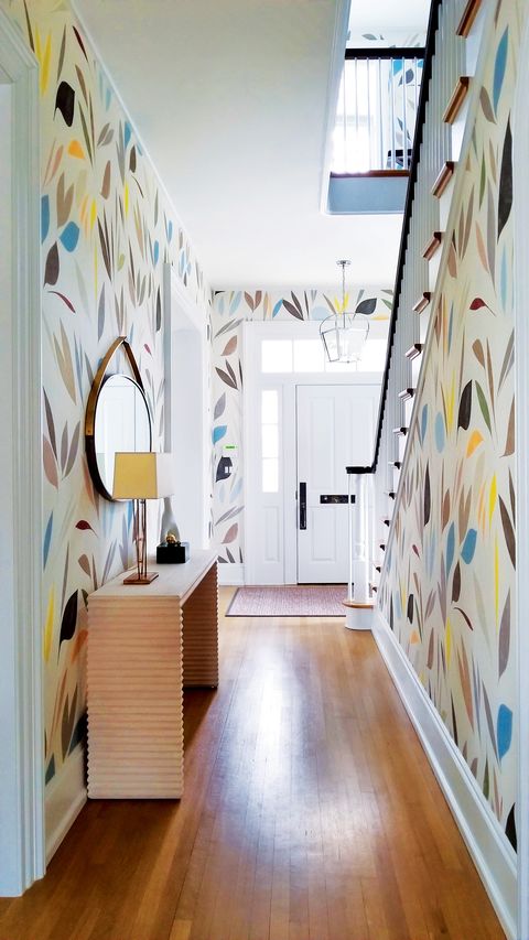 Hallway with colorful abstract botanical print wallpaper