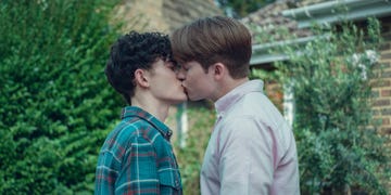 joe locke as charlie and kit connor as nick kissing in heartstopper season 2