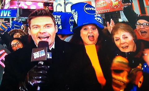 joelle and ginger behind ryan seacrest in times square on new year's eve