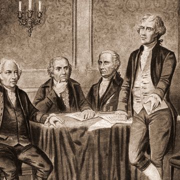 a drawing of john adams, robert morris, alexander hamilton, and thomas jefferson gathered around a table with papers on it