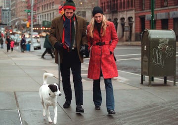 john f kennedy jr walks with wife