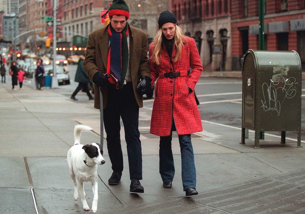 John F. Kennedy Jr. Walks with Wife