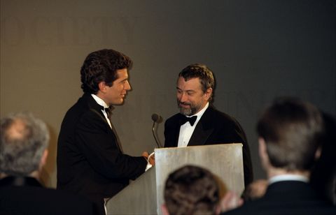 John F. Kennedy Jr. presents Robert De Niro with the Jacqueline Kennedy Onassis Medal during the Municipal Art Society Gala