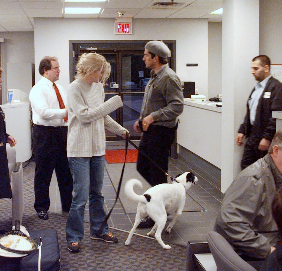 john kennedy jr and wife carolyn bessette kennedy, with dog