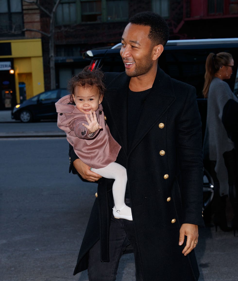 john legend and his daughter luna walking in new york city december 13, 2017