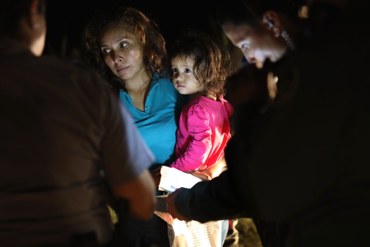 A mother and child at the border in Texas