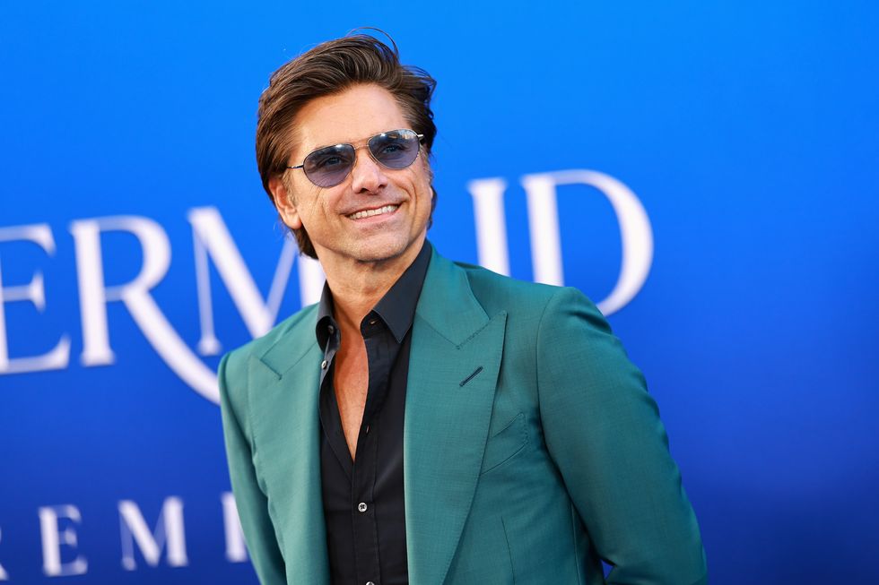 John Stamos attends the World Premiere of DC's Little Mermaid on May 08, 2023 in Hollywood, California.