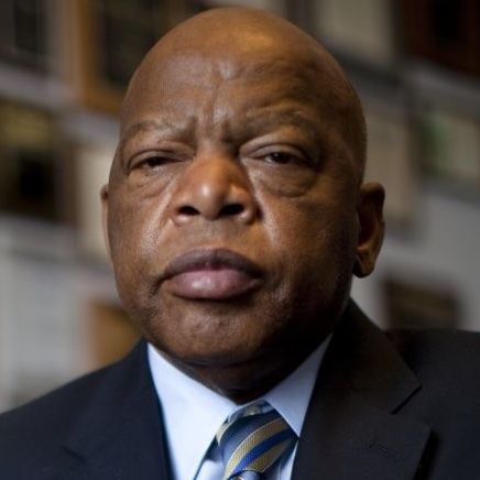 civil right icon john lewis in a navy suit