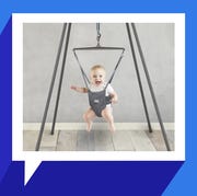 baby in jolly jumper with stand baby in jolly jumper with stand
