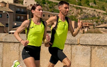 two runners in athletic wear participating in outdoor exercise