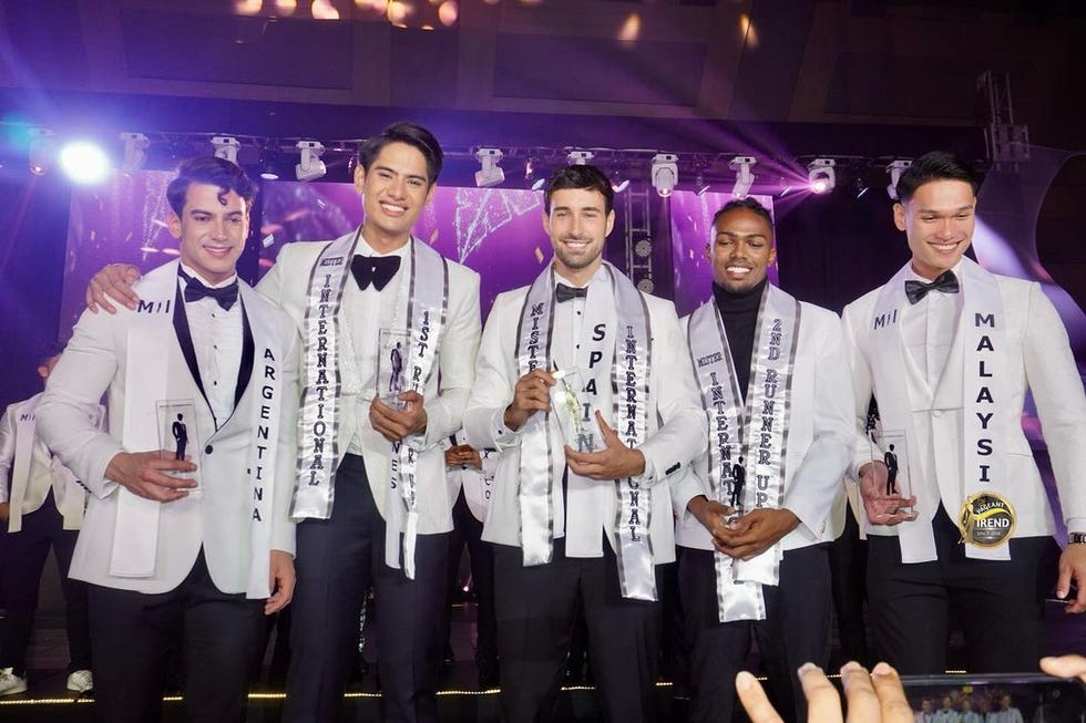 a group of men posing for a picture