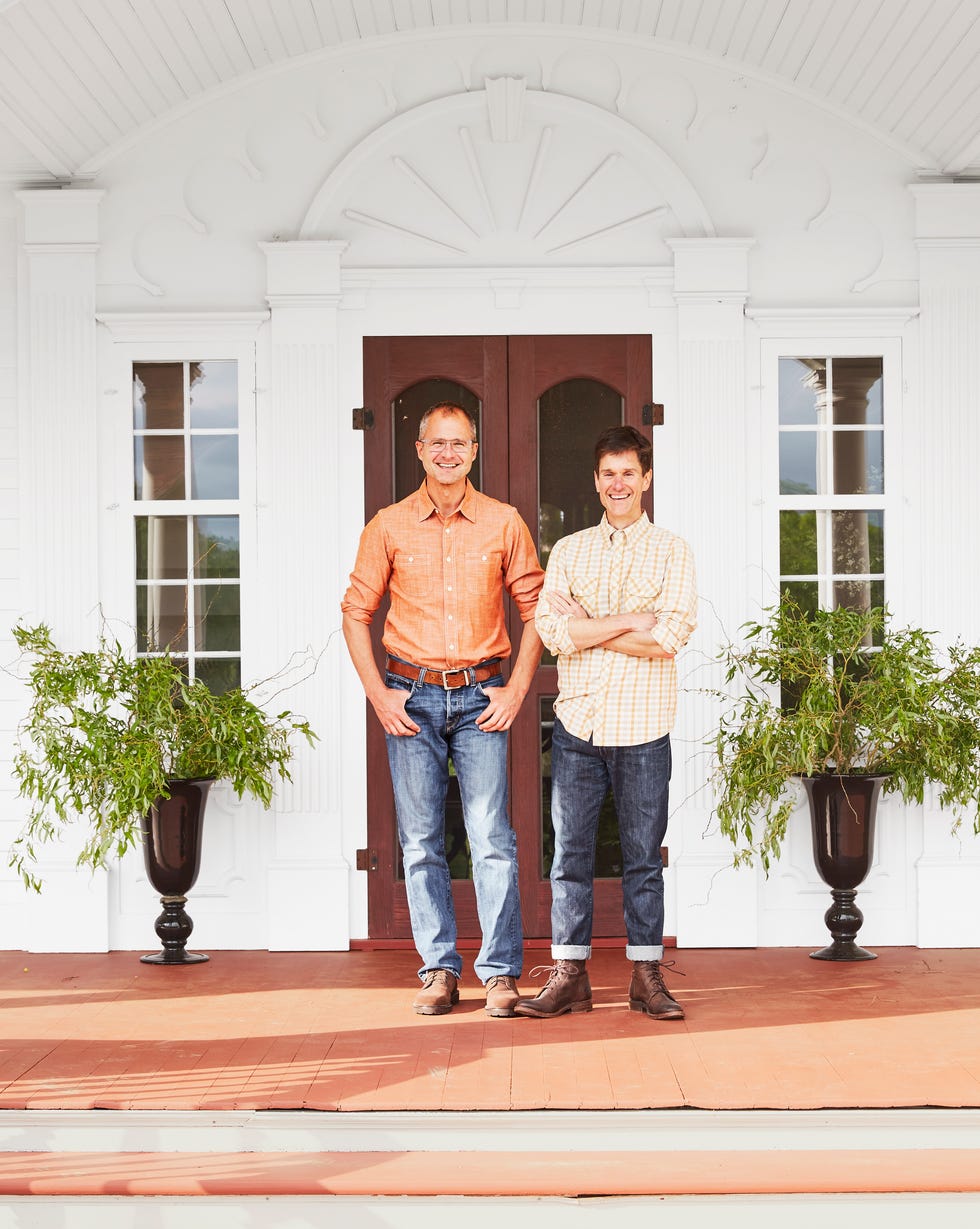 Josh Kilmer Purcell and Brent Ridge stand at their front door