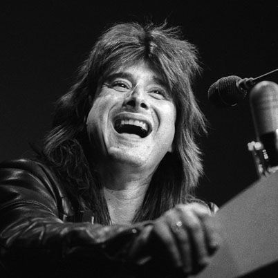 SAN FRANCISCO, CA-MARCH 21: Steve Perry at the podium as Journey receives the Outstanding Group award at the Bay Area Music Awards (BAMMIES) at the Civic Auditorium in San Francisco on March 21, 1987. (Photo by Clayton Call/Redferns)