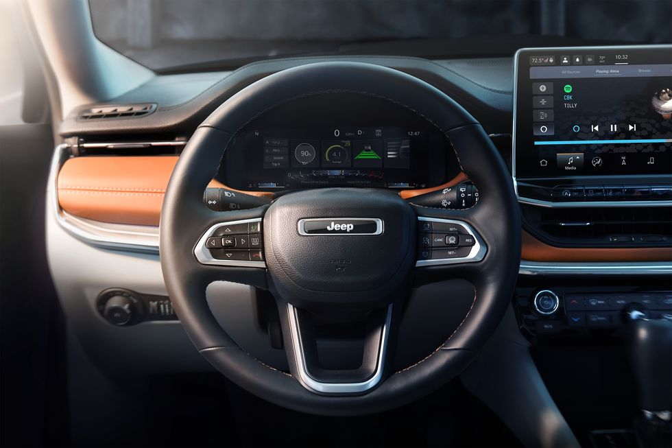 the 2023 jeep® compass’ multifunction steering wheel features a compact design and driver airbag module that delivers a more spacious layout and allows effortless access to the electronic vehicle information center the driver's cockpit is thoughtfully