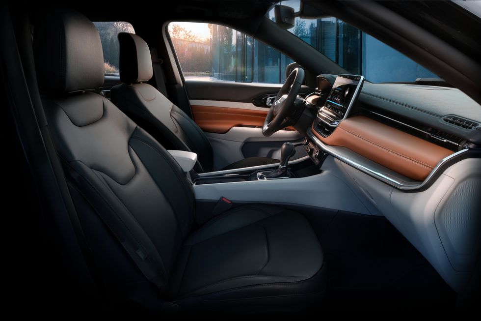 the 2023 jeep® compass limited model features a new black and steel grey interior with wrapped sepia accents on the mid panel and doors