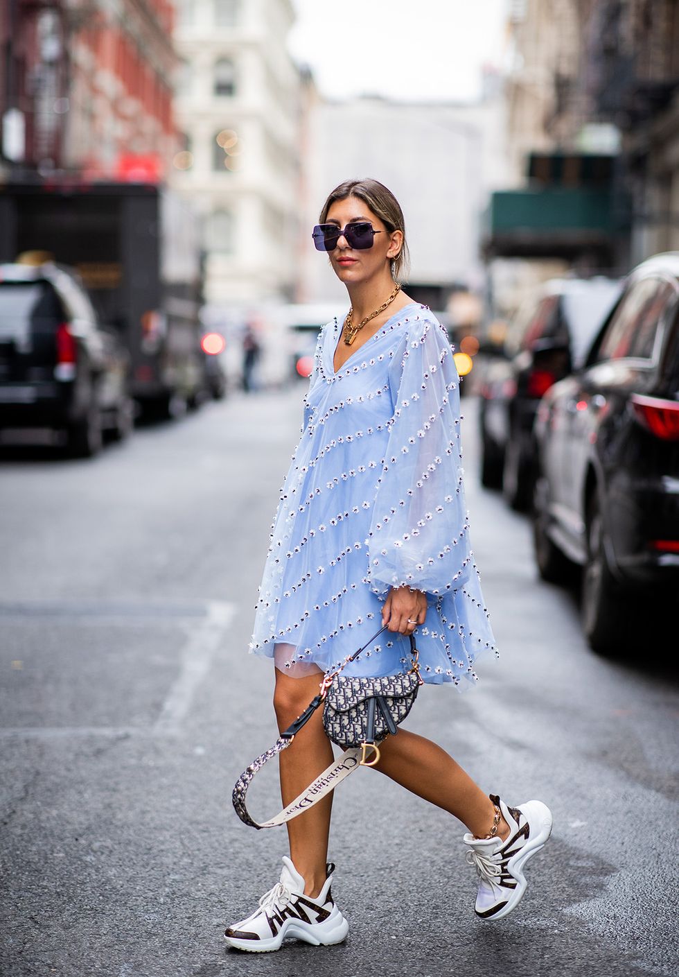 Aylin Koenig wearing blue dress Ganni, sneaker Louis Vuitton, Dior