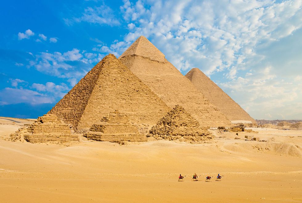 Pyramid, Monument, Landmark, Historic site, Ancient history, Natural environment, Unesco world heritage site, Ecoregion, Sand, Wonders of the world, 