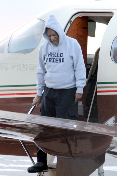 Bill Cosby Stepping Off Plane