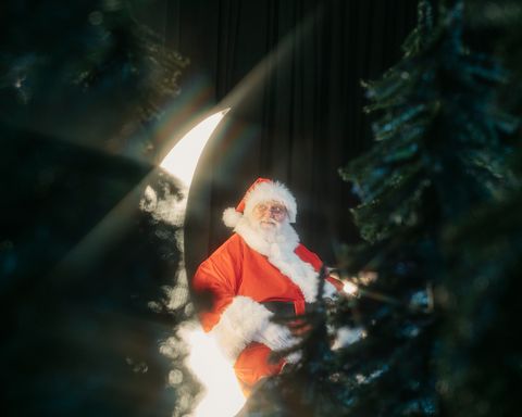 Santa claus, Christmas, Fictional character, Tree, Event, Holiday, Space, Interior design, Christmas eve, 
