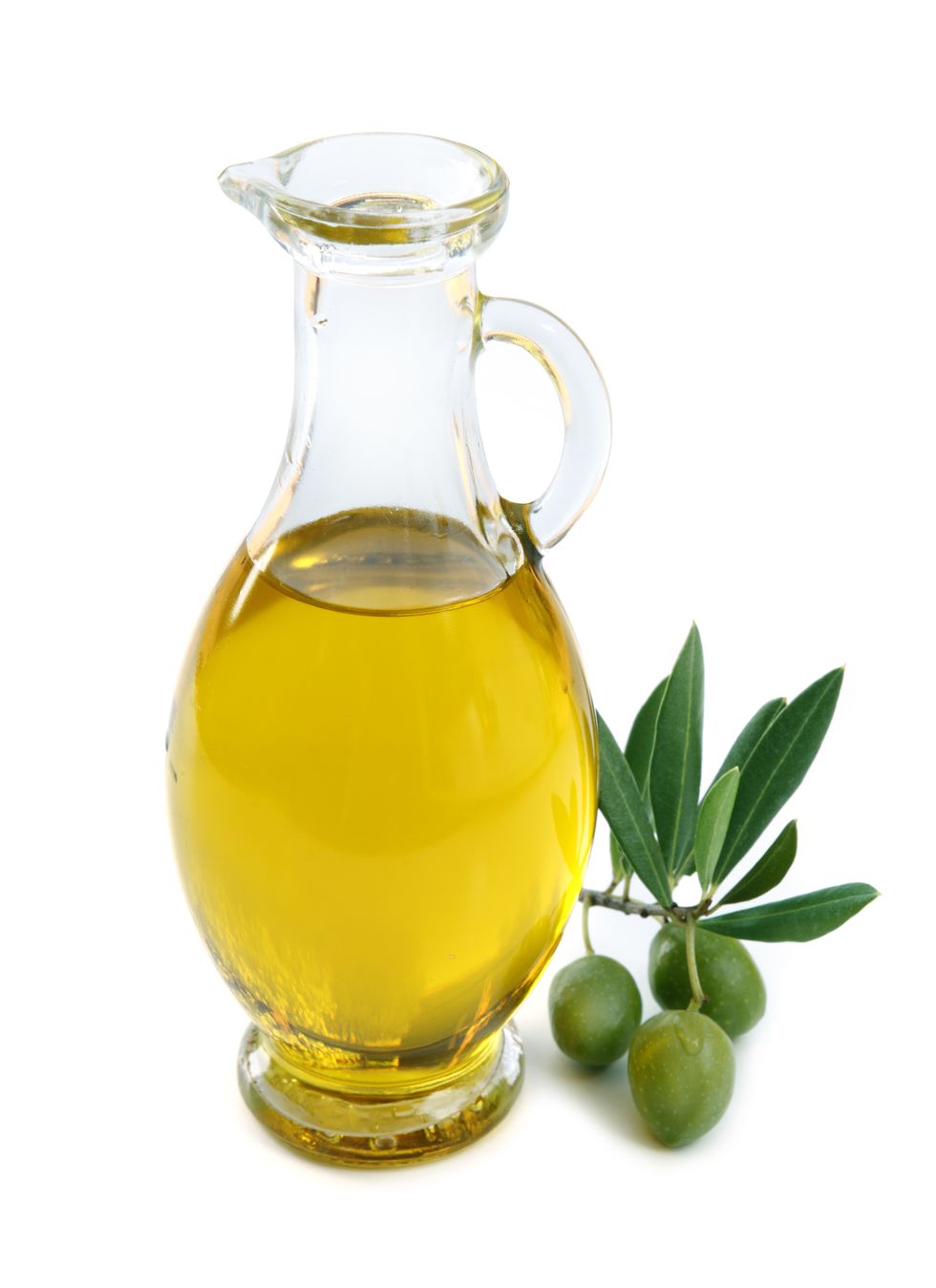 Jug of olive oil with 3 olives by the side