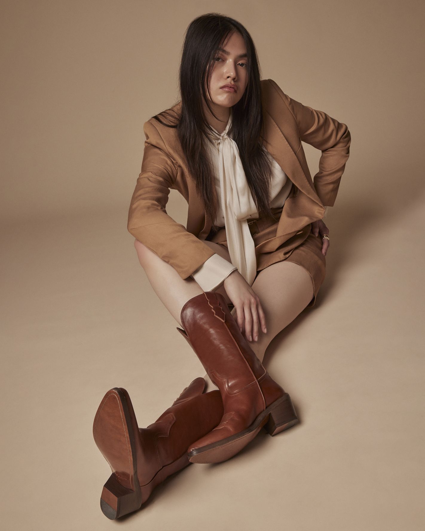 See Kendall Jenners Chocolate Brown Skirt and Cowboy Boots
