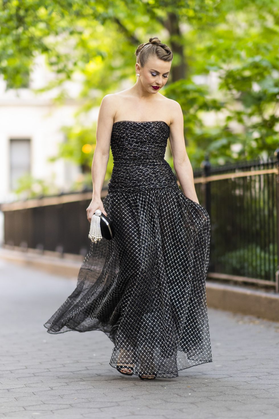 julianne hough is seen wearing a vintage haute couture yves saint laurent dress with shoes and a handbag by roger vivier in washington square park