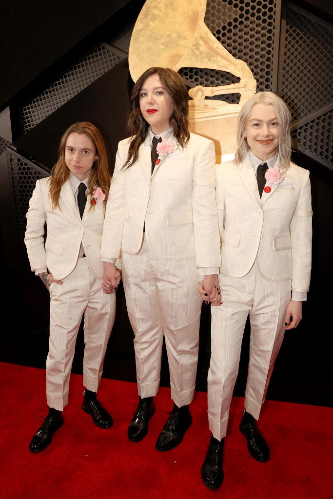 66th grammy awards red carpet boygenius julien baker, lucy dacus, and phoebe bridgers