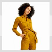 Clothing, Yellow, Fashion model, Standing, Fashion, Workwear, Waist, Outerwear, Sleeve, Suit, 