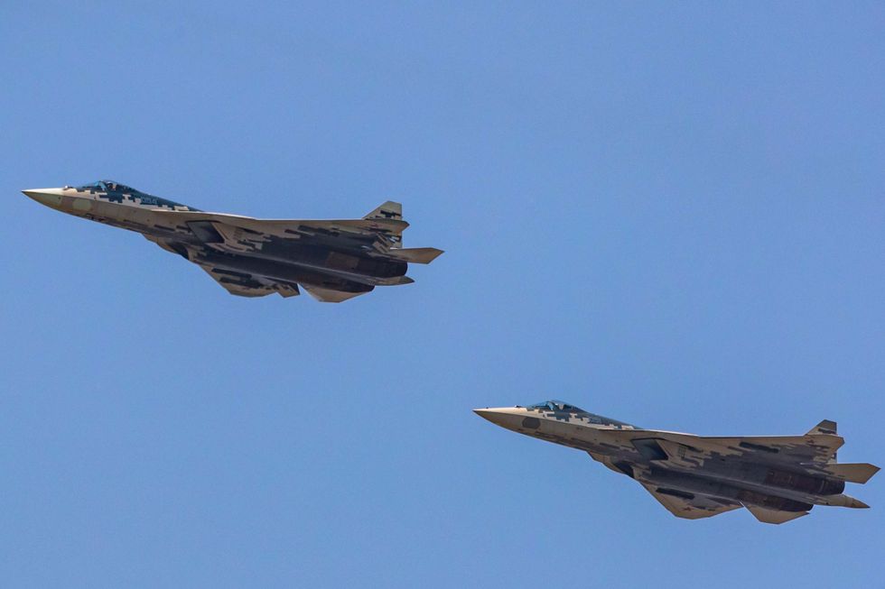 su57 felon russia fighter jets fly over moscow