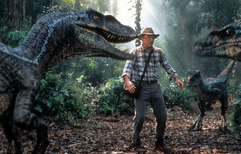 alan grand is confronted by three dinosaurs in a scene from 'jurassic park iii,' the third film if you want to watch the jurassic park movies in order