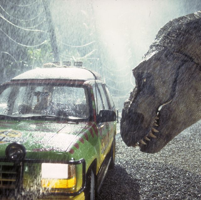 a tyrannosaurus rex menaces the theme parks first customers in a scene from the film jurassic park, 1993  photo by murray close getty images watch this first to see the jurassic park movies in order