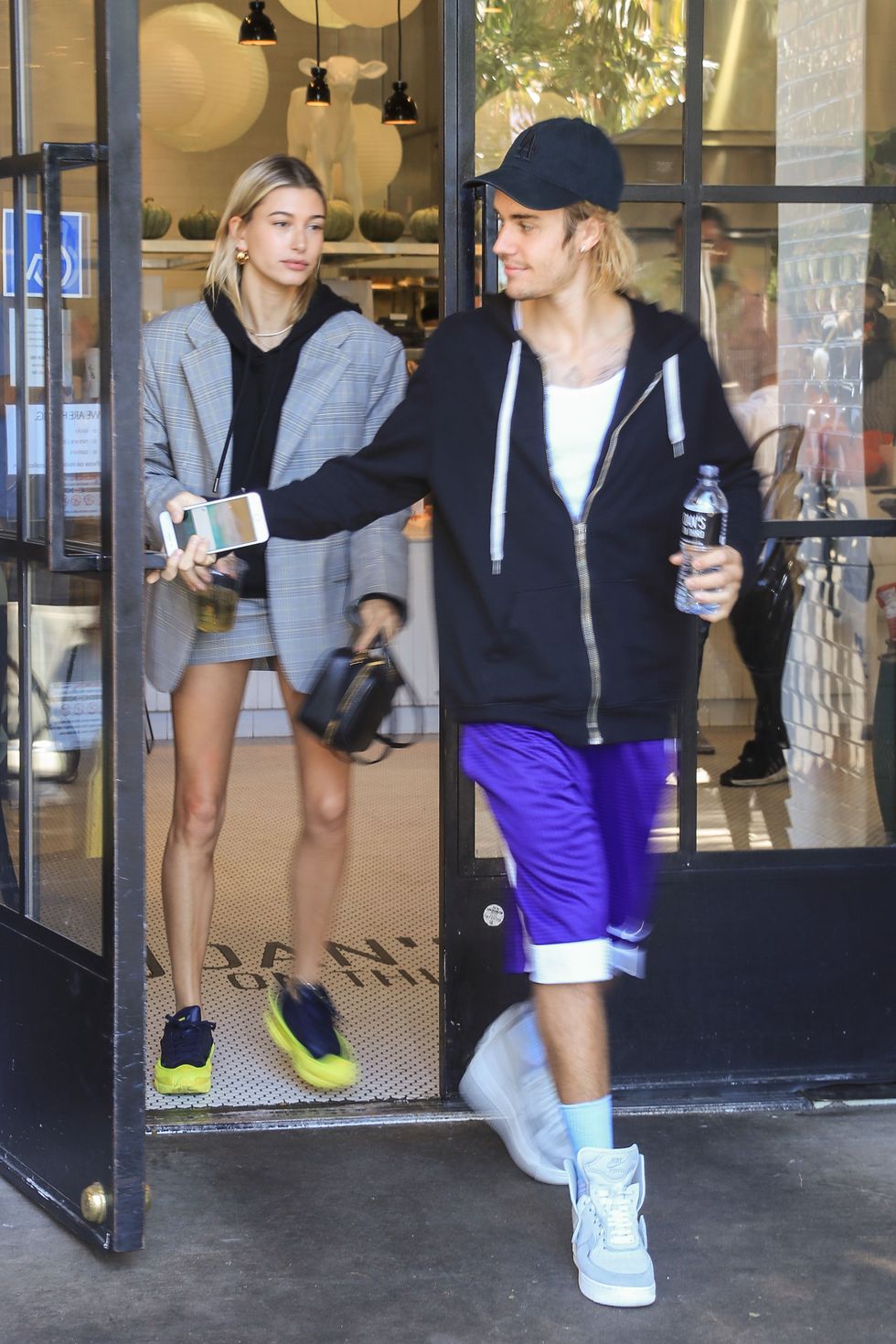 Hailey Baldwin with Justin Bieber at Joan's on Third October 12