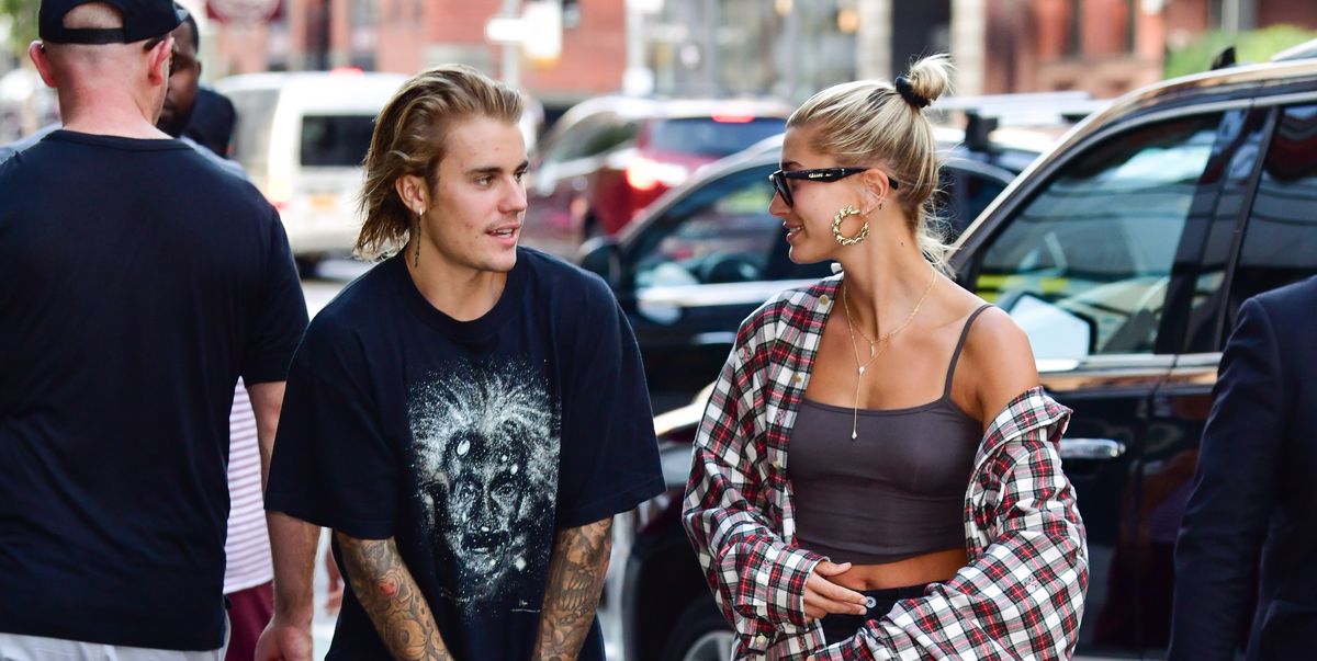 Justin Bieber and Hailey Baldwin smile after pop star gets haircut