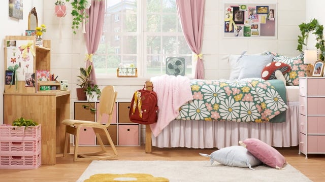 a bedroom with a bed and a chair