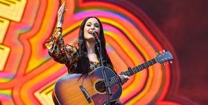 kacey musgraves performing with a guitar during austin city limits festival at zilker park on october 13, 2019 in austin, texas