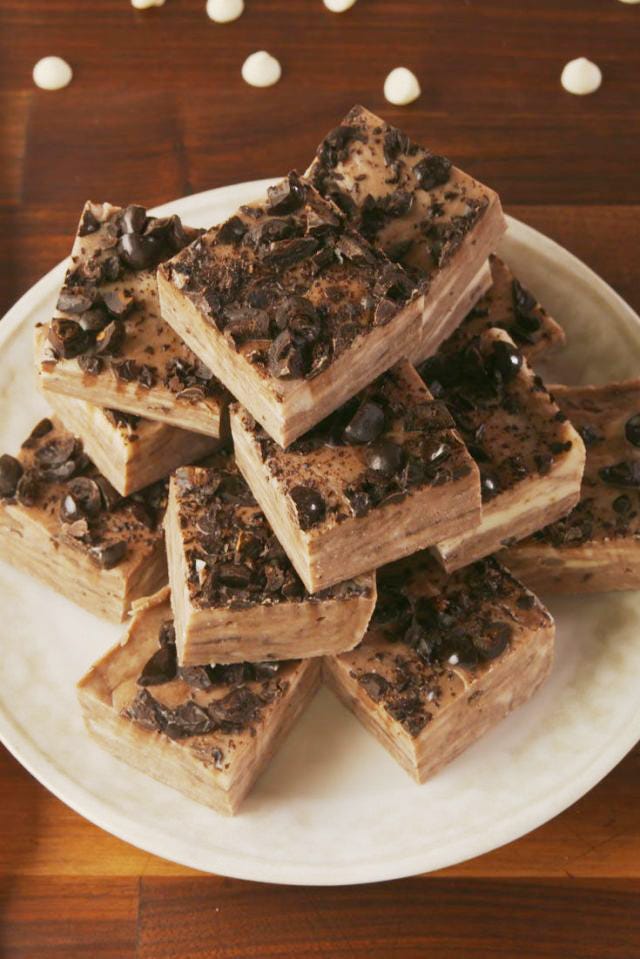 stack of chocolate and white chocolate kahlua fudge topped with crushed espresso beans