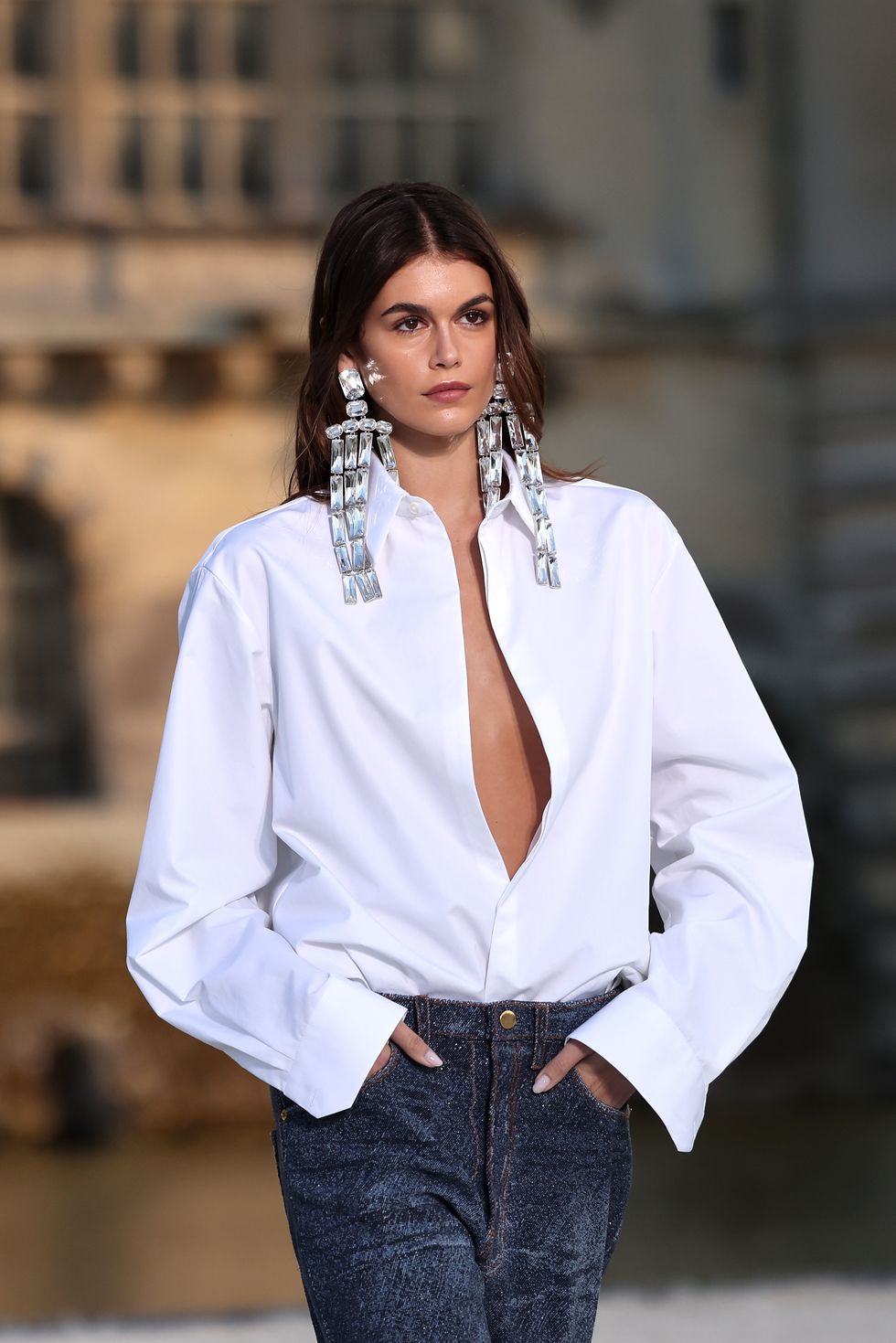 Kaia Gerber opens Valentino Couture show in unbuttoned shirt