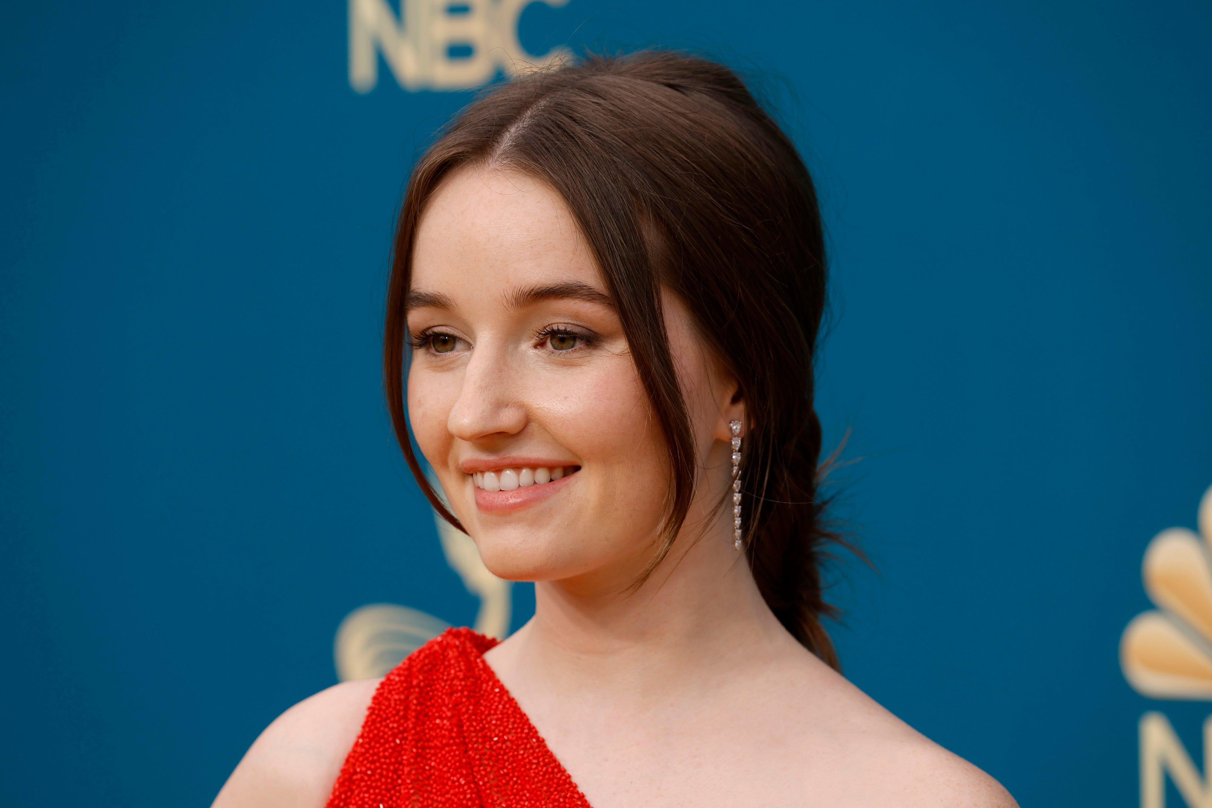 'Last Man Standing' Actress Kaitlyn Dever Wears Stunning Red Gown With a Thigh-High Slit to Emmys