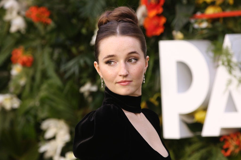 'Last Man Standing' Star Kaitlyn Dever Wears Dramatic Red Carpet Dress with a High Leg Slit