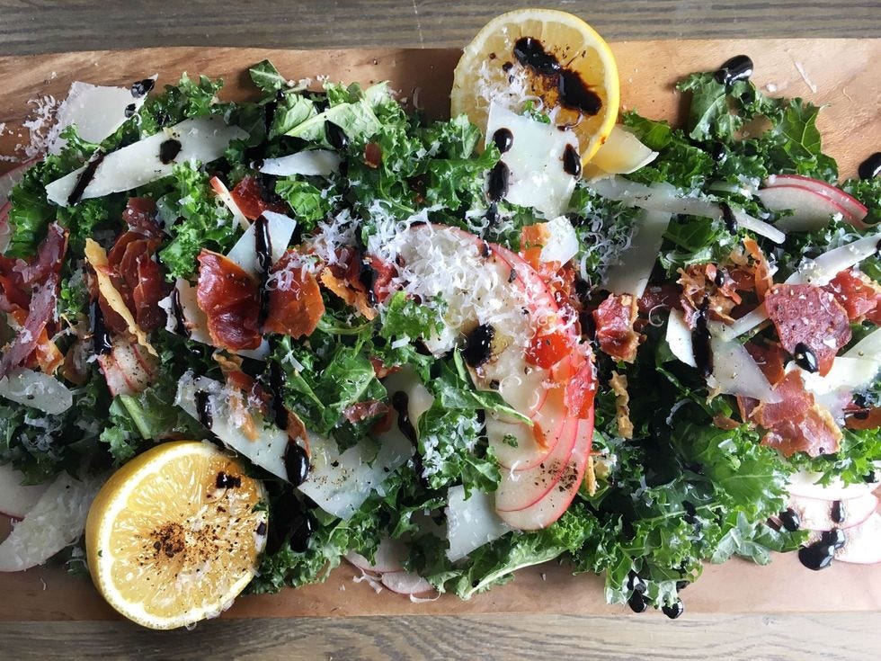 kale, apple, pecorino salad with crispy prosciutto and balsamic drizzle