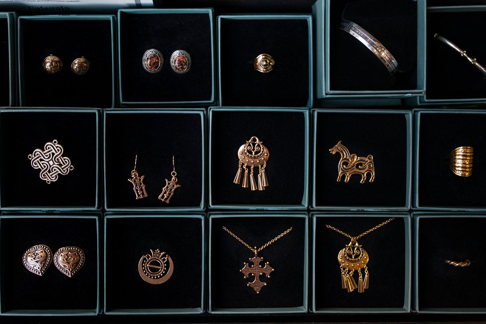 a group of gold and silver jewelry