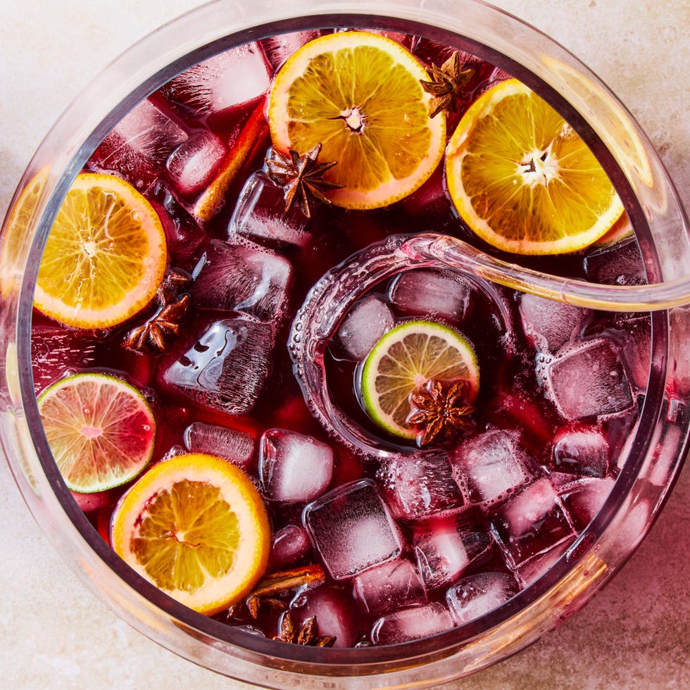 cola and red wine punch with orange and lime slices