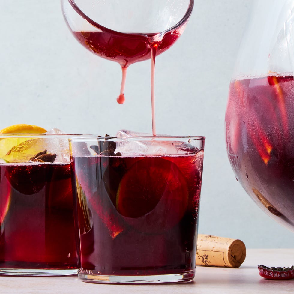 cola and red wine punch with orange and lime slices