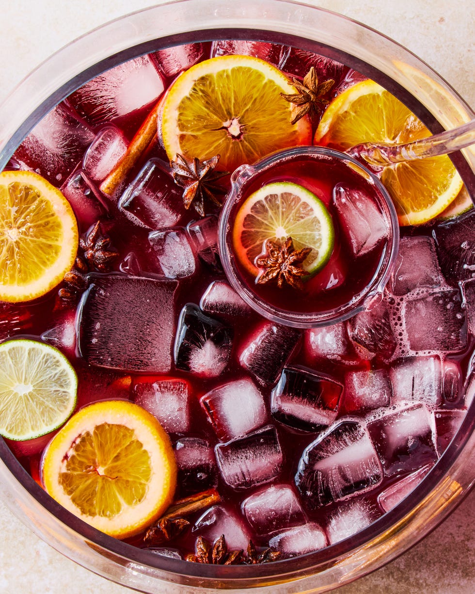 cola and red wine punch with orange and lime slices