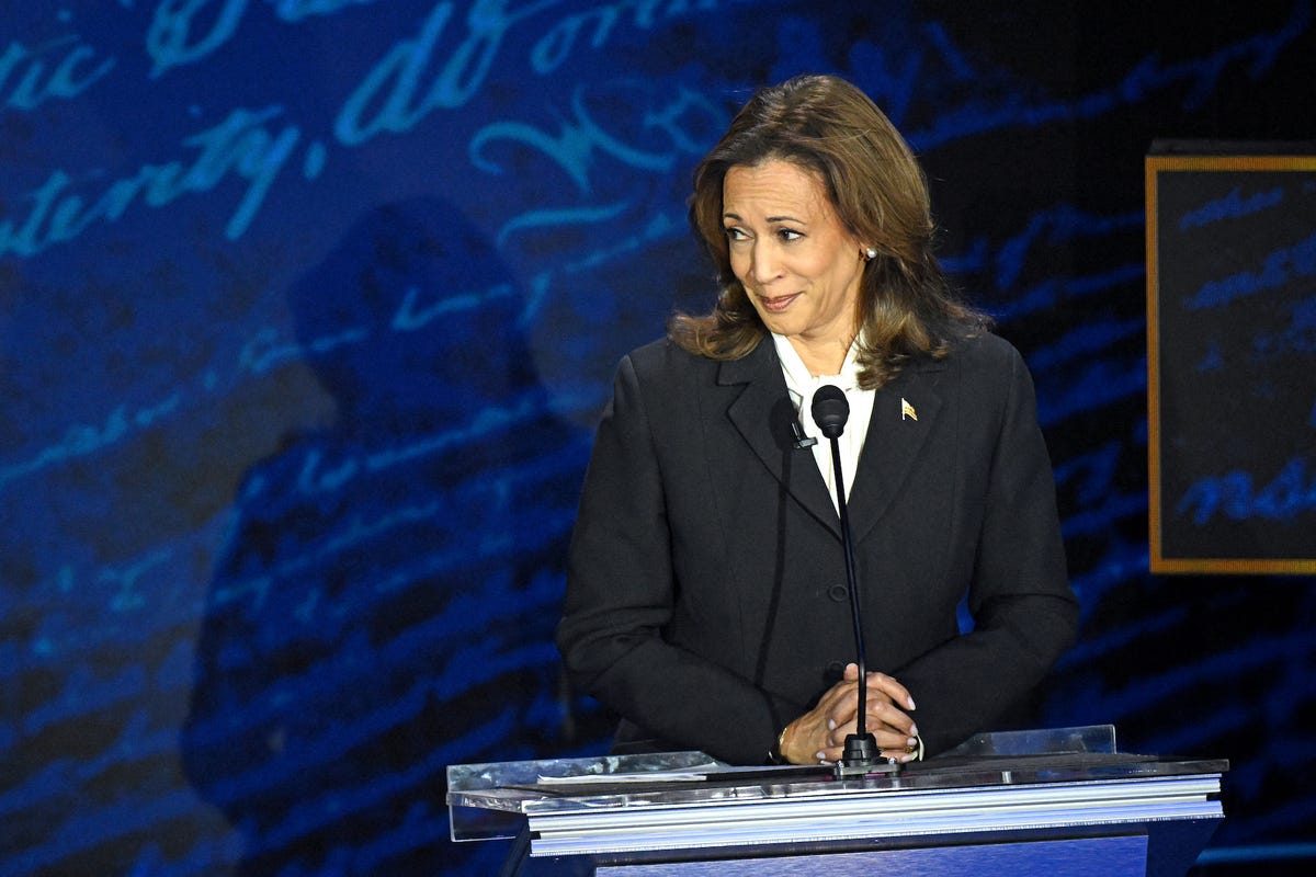 The Subtle Meaning Behind Kamala Harris’ Black Power Suit And Pussy Bow Blouse At The Debate